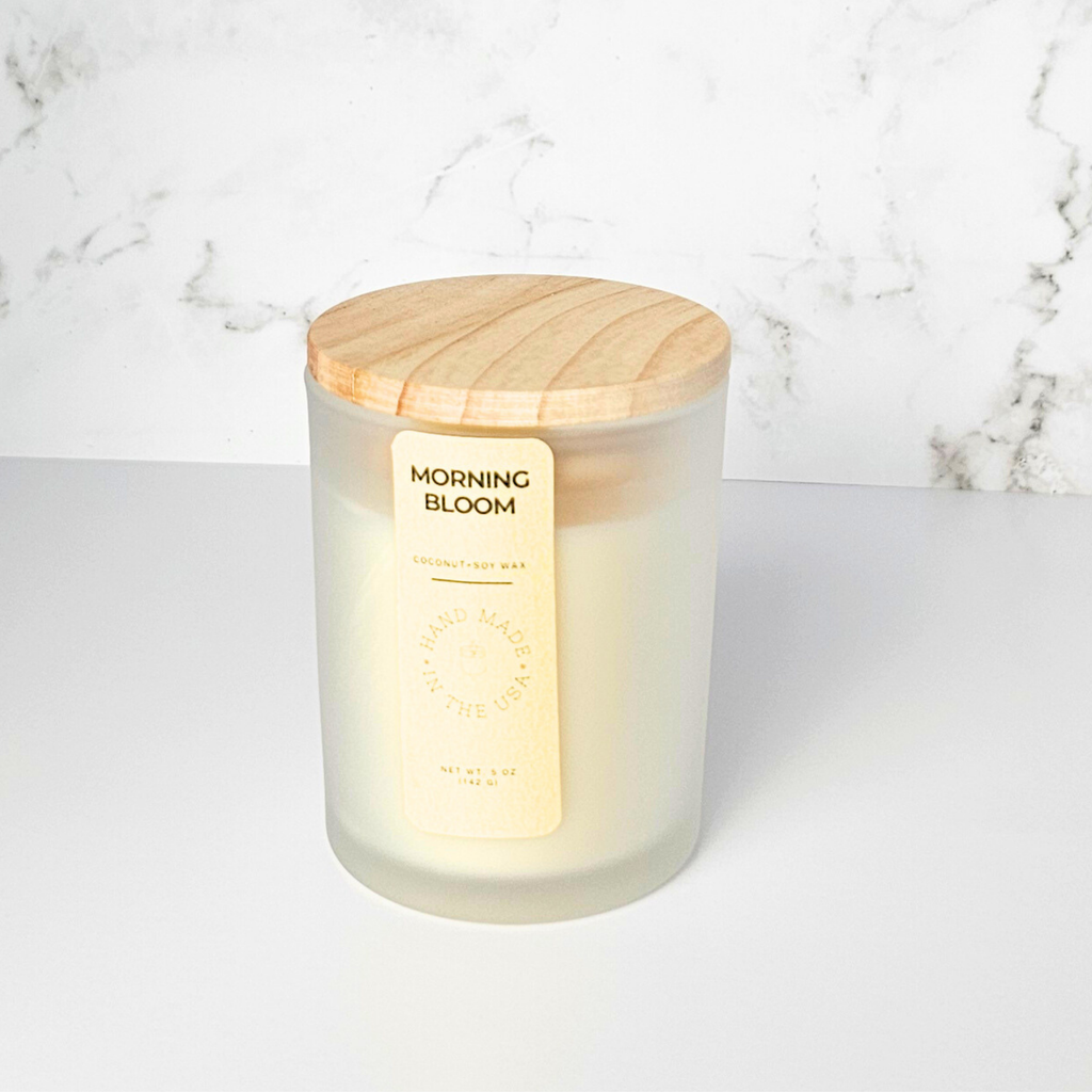 Wickless Candle labeled 'Morning Bloom' with a wooden lid on a marble surface