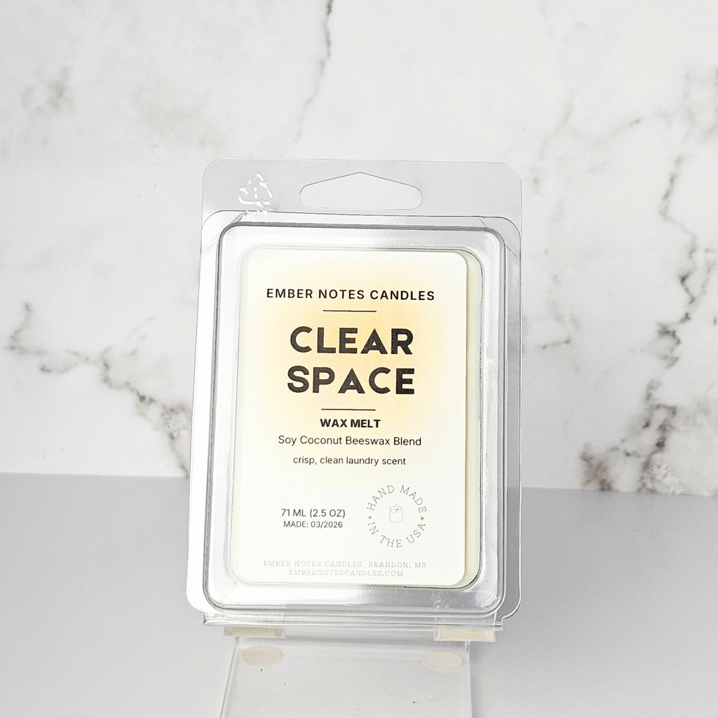 Ember Notes Candles wax melt packaging on a marble surface