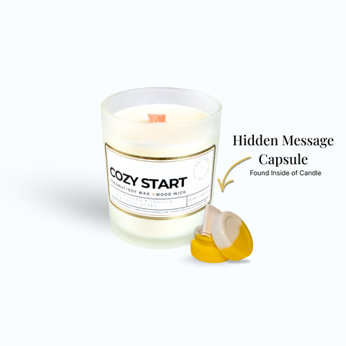 A candle with a label that says cozy start