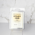 Ember Notes Candles Steady Mind wax melt packaging on a marble background