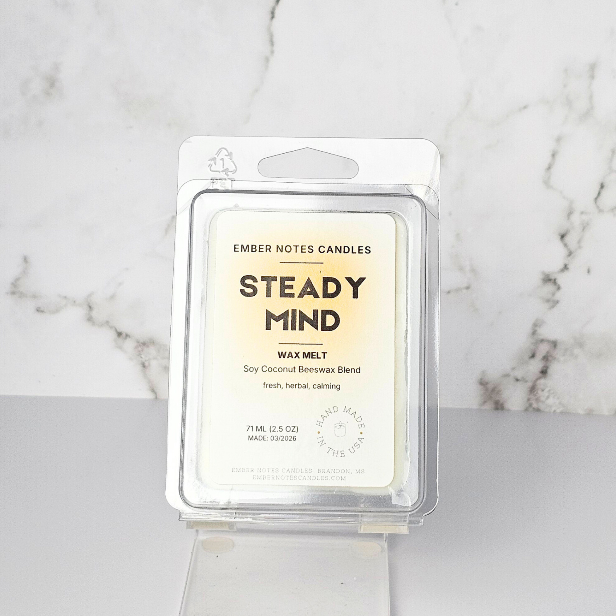 Ember Notes Candles Steady Mind wax melt packaging on a marble background