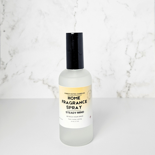 Home fragrance spray bottle on a marble background